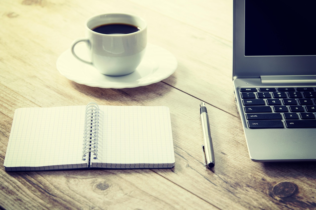 Coffee, computer, cup — How IP TV Supports High-Quality Streaming Without Buffering Issues