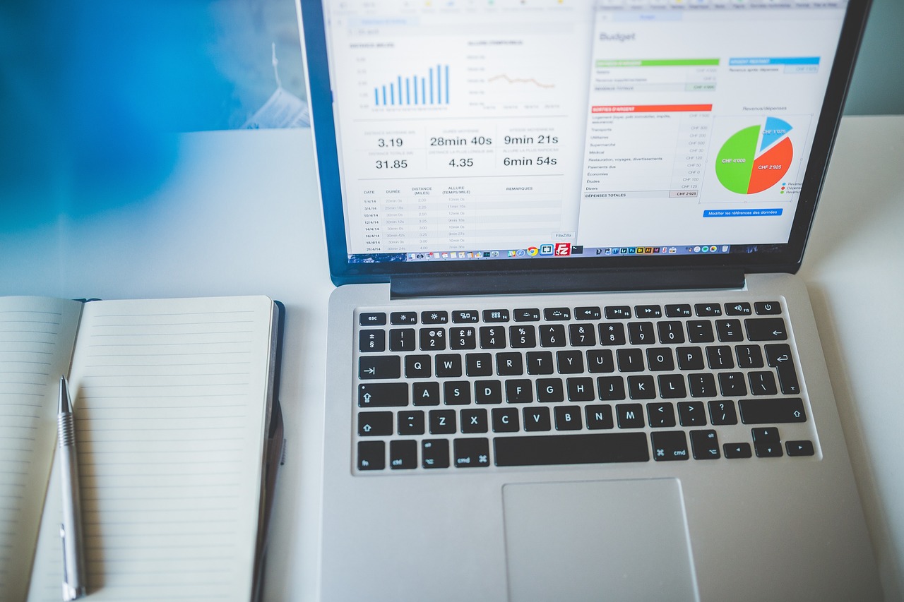 Laptop, notebook, business — Simplified Borrowing: Discovering the Easiest Banks for Loans in Canada