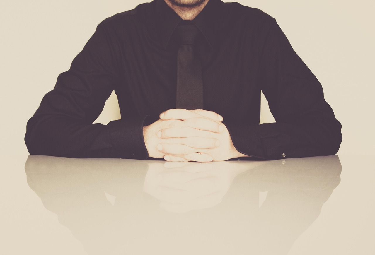 Businessman, office, necktie — The Benefits of Using TextVerified for Secure Communication